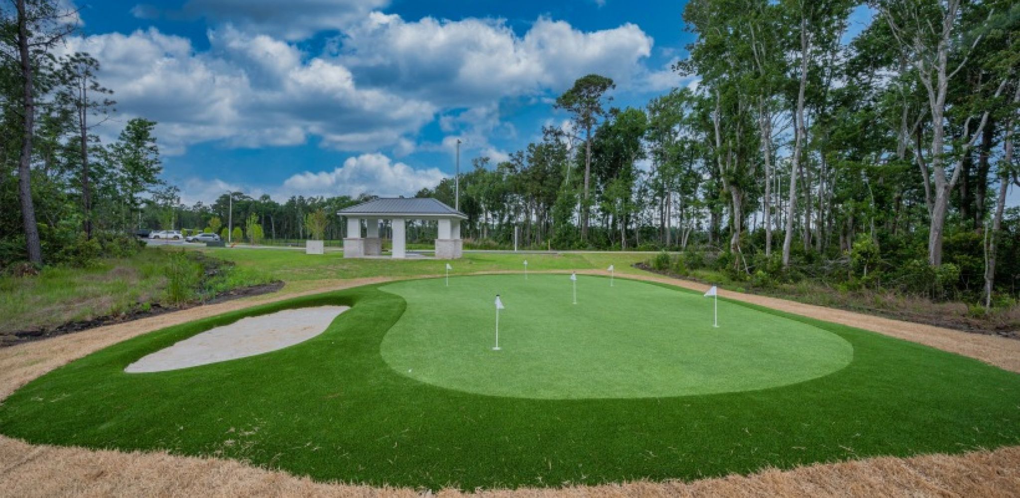 Hawthorne at Pine Forest putting green outdoor amenity area